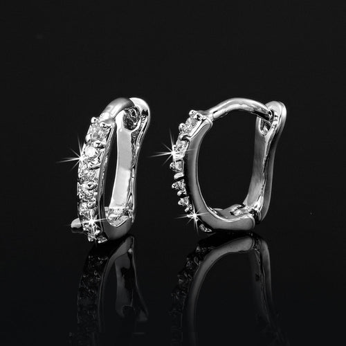 Sterling silver huggie hoop earrings with clear crystal pavé