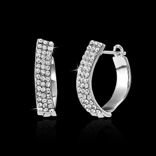 Geometric silver huggie earrings with crystal pavé hoop, hinged clasp
